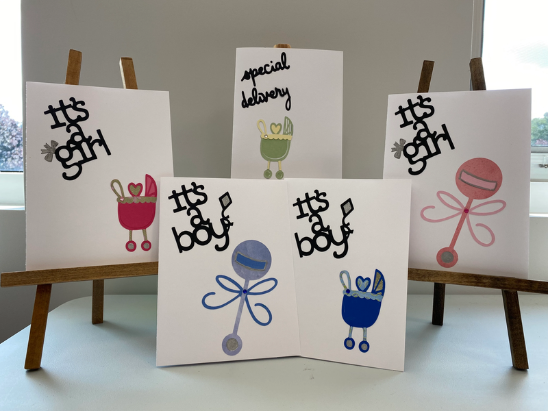 A collection of baby greeting cards.