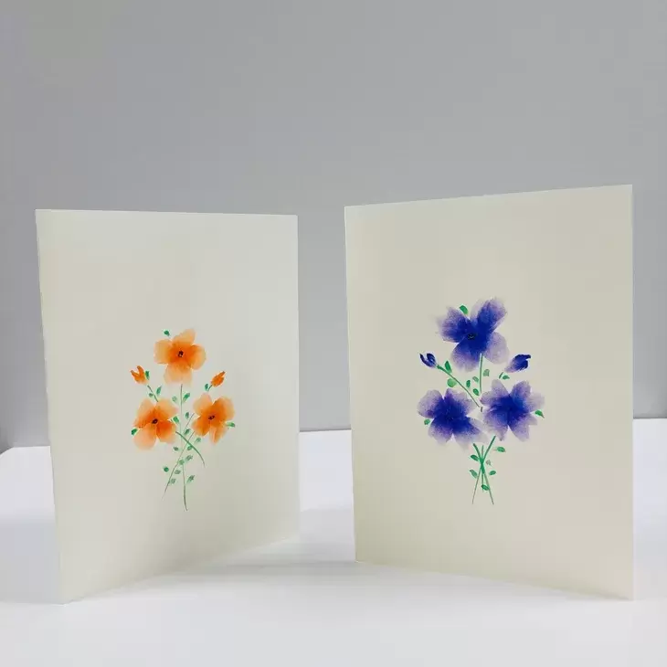 Two watercolour flower cards.