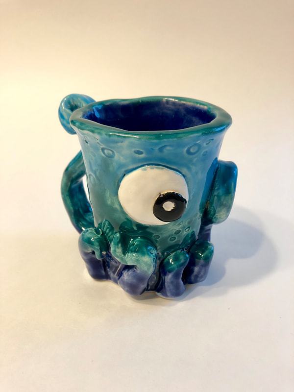 A blue octopus mug.