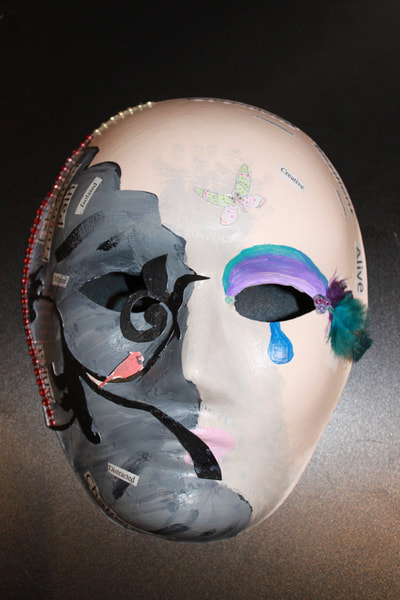 Rebekah - There is a side to brain injury that is invisible and on the surface I appear fine to everyone. The right  side of my mask shows this. The tear is there to show the frustration and sadness that occurs when trying to explain difficulties to others or even in asking for help and it always coming across wrong BECAUSE of how I appear on the surface. 
