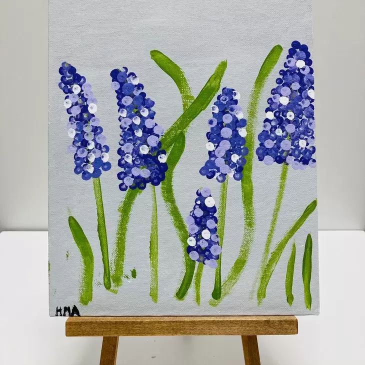 A painting of lilacs.